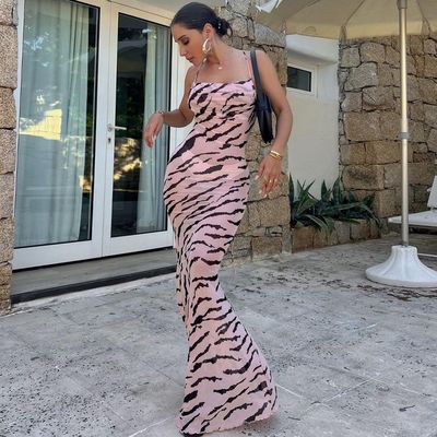 Nuova moda estiva sexy senza schiena con abito a maglia sottile