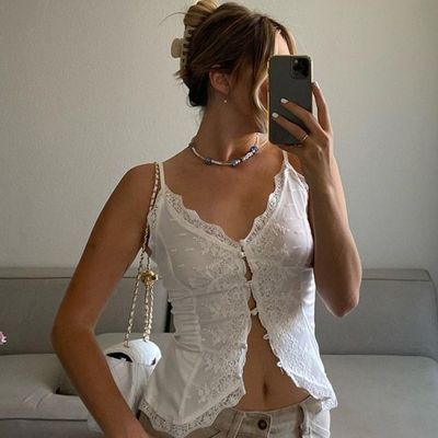 Stile femminile American Spice Girl pizzo pizzo sexy V-neck cardigan fibbia cinturino giubbotto piccolo top
