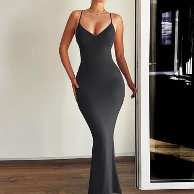 Nuova gonna a coda di pesce di colore massiccio, sexy vestito con la cintura.