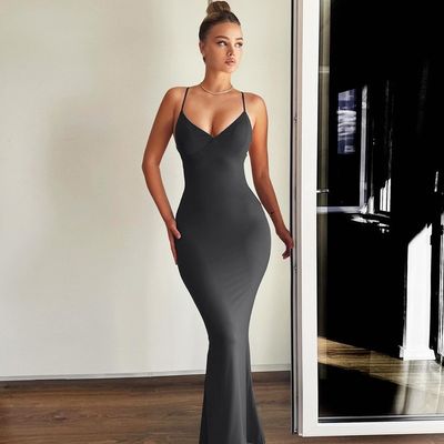 Nuova gonna a coda di pesce di colore massiccio, sexy vestito con la cintura.