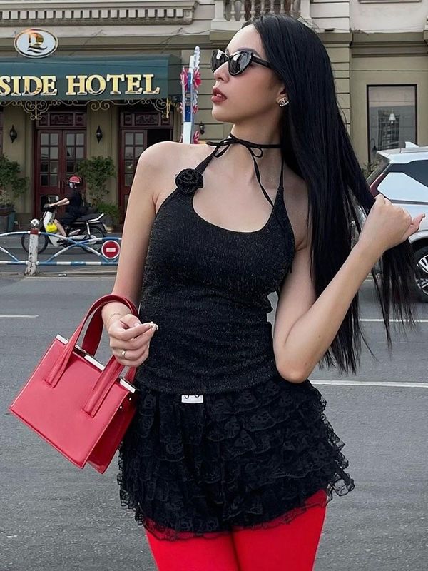 Nuova moda sexy spezia ricamato pizzo fino al tassello vita sottile giubbotto di colore solido